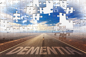 Dementia Concept: Road With Missing Puzzle Pieces In Sky