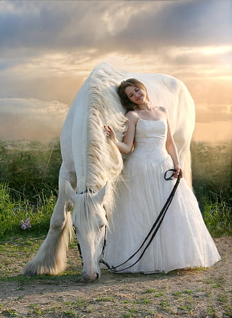 Woman in White Dress Hugging White Horse at Sunset