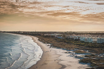 Aerial View of Coastal Beach at Golden Hour