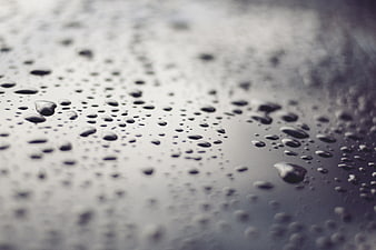 Close-up of water droplets on a wet surface
