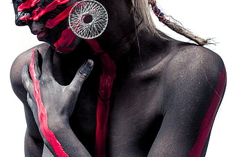 Artistic Portrait of Woman with Black and Red Body Paint
