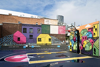 Colorful Urban Basketball Court with Vibrant Mural Art