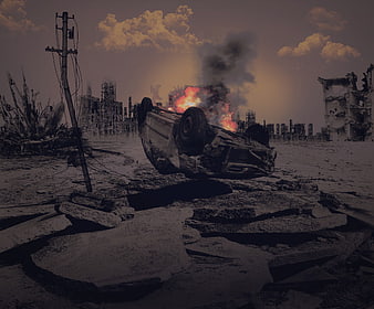 Overturned burning car in post-apocalyptic ruined city landscape