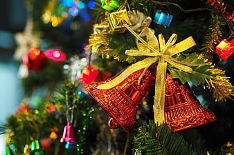 Red Christmas Bells with Gold Bow on Tree