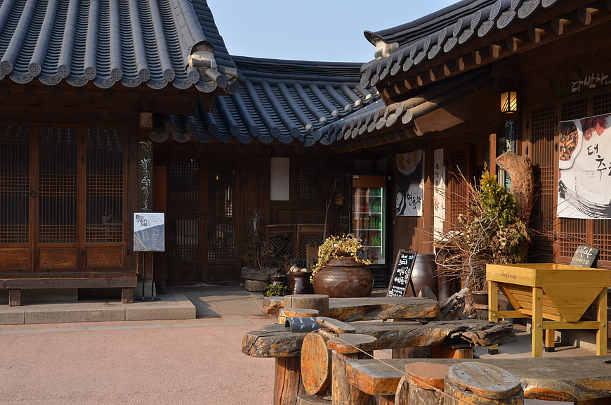 Traditional Korean Hanok Courtyard with Wooden Furniture