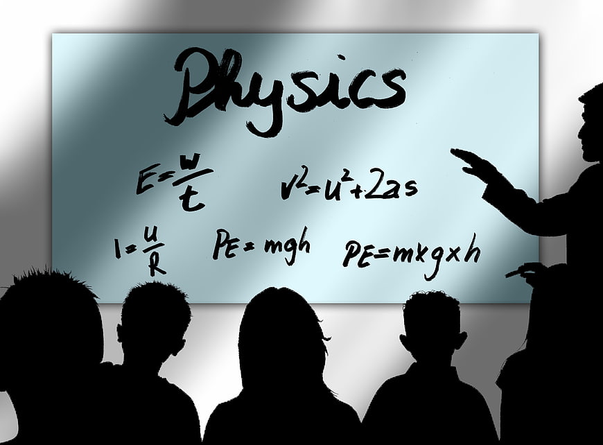Silhouette of students and teacher in physics classroom with equations