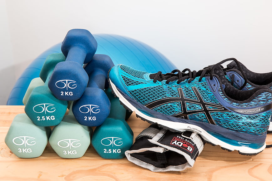 Fitness Equipment: Dumbbells, Sneakers, and Exercise Ball
