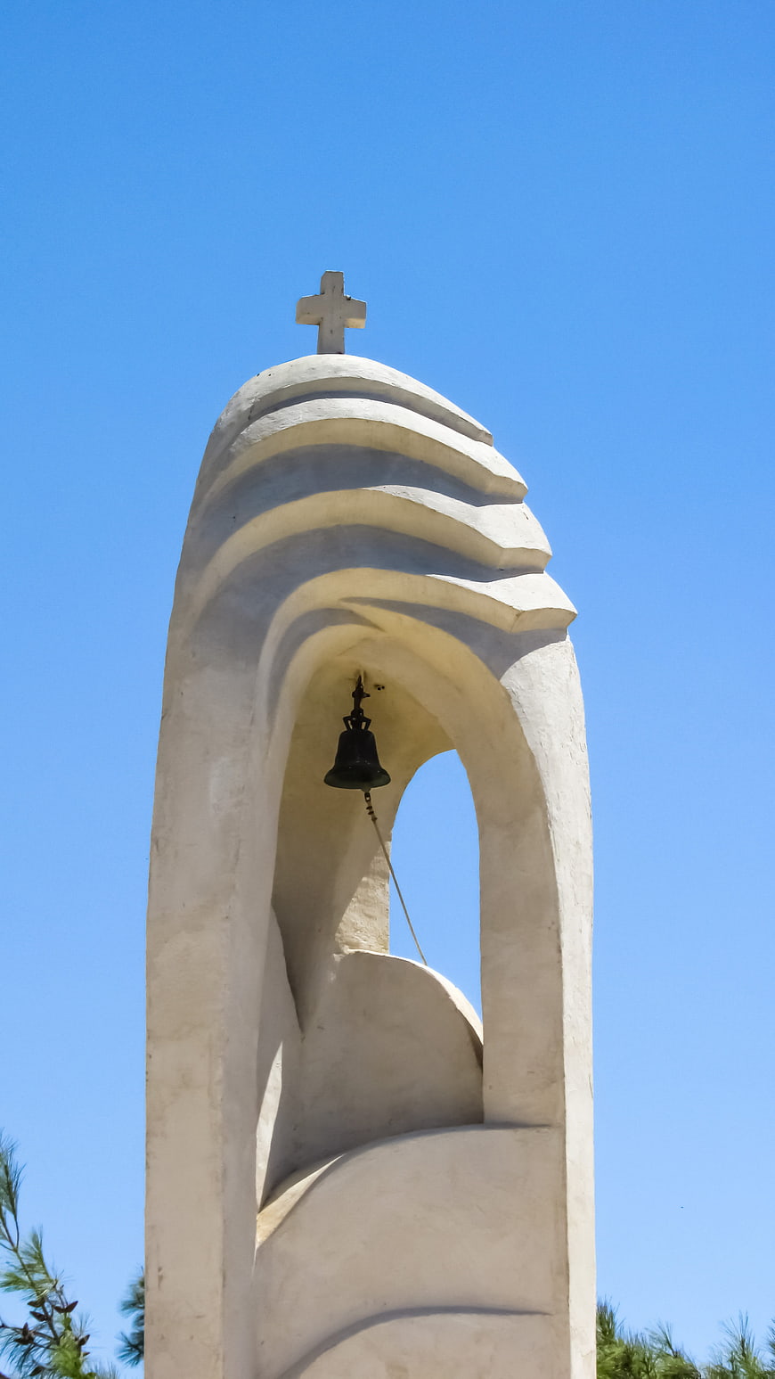 White Church Bell Tower Against Blue Sky