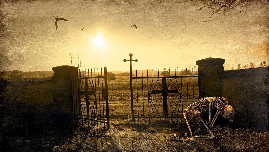 Surreal Skeleton Kneeling at Cemetery Gate at Sunset
