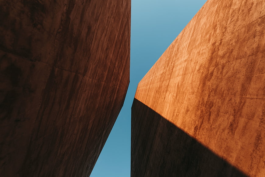 Abstract Concrete Architecture with Blue Sky and Shadows