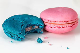 Colorful Blue and Pink Macarons on White Background