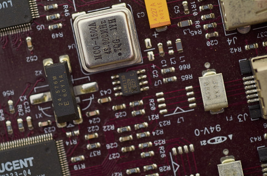 Macro shot of red electronic circuit board components