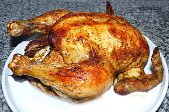 Whole Roasted Chicken on White Plate