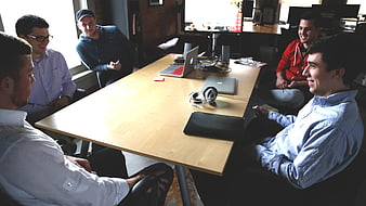 Young startup team meeting in modern office