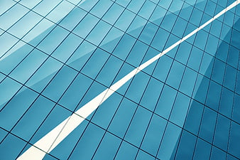 Abstract Blue Glass Building Facade with Diagonal White Reflection
