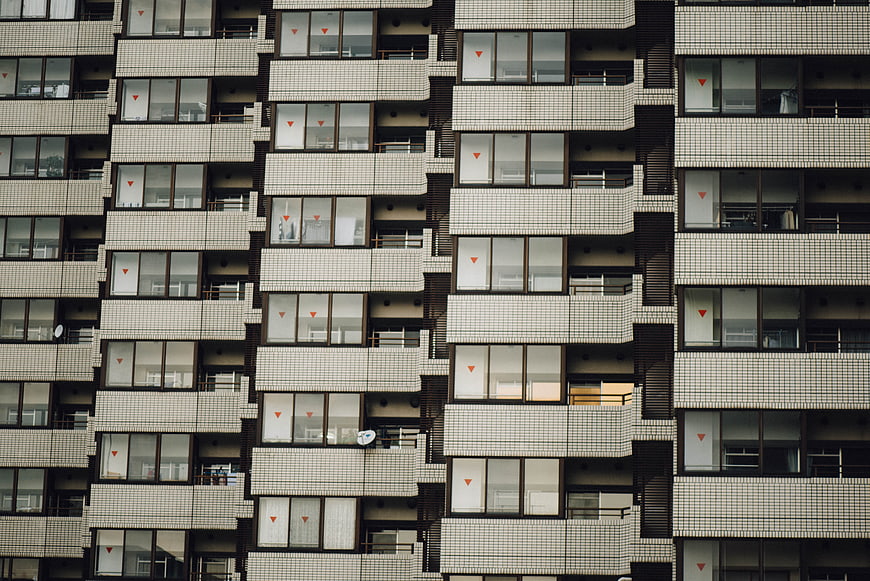 Modern Apartment Building Facade with Grid Pattern
