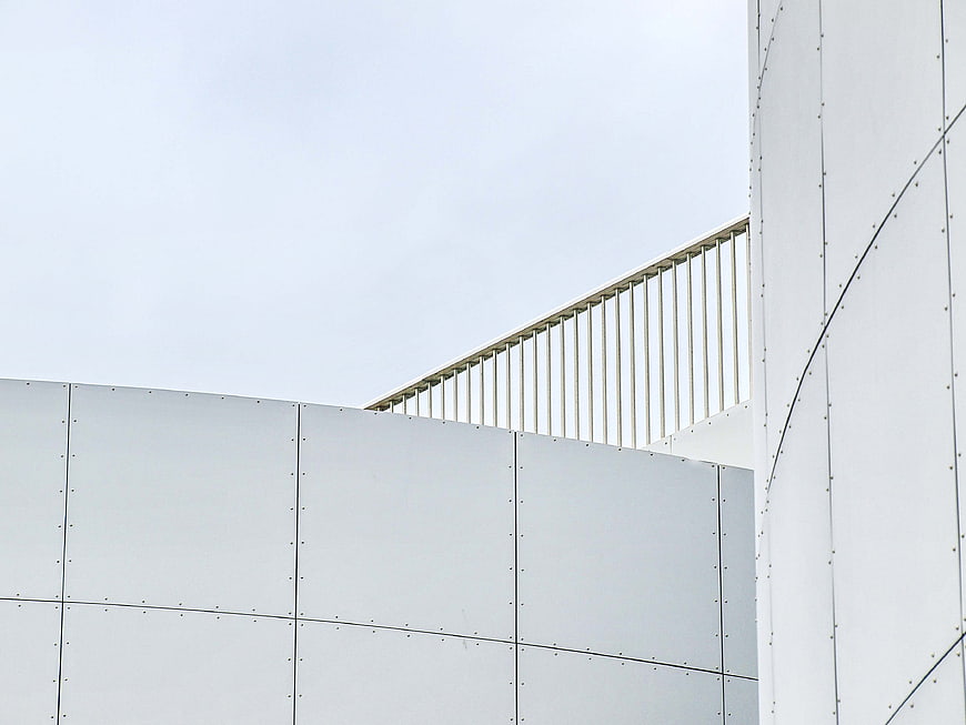 Minimalist White Modern Architecture Facade with Metal Panels