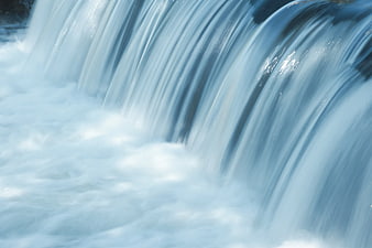 Long Exposure Waterfall Flowing Over Rocks