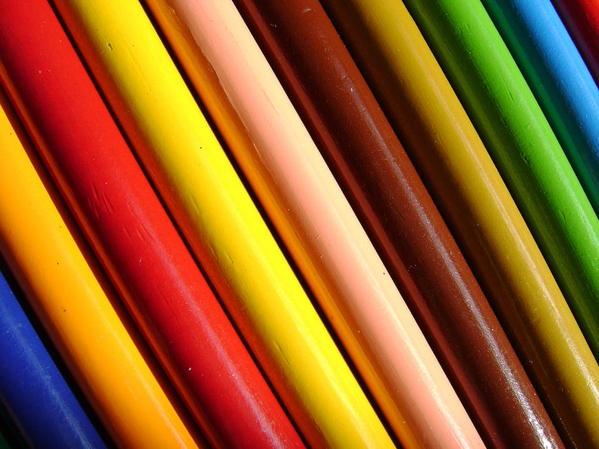 Close-up of colorful pencils arranged in diagonal stripes