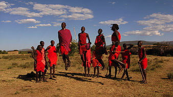 Maasai Men Performing Traditional Jumping Dance in Kenya