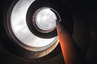 Low angle view of modern circular concrete architecture