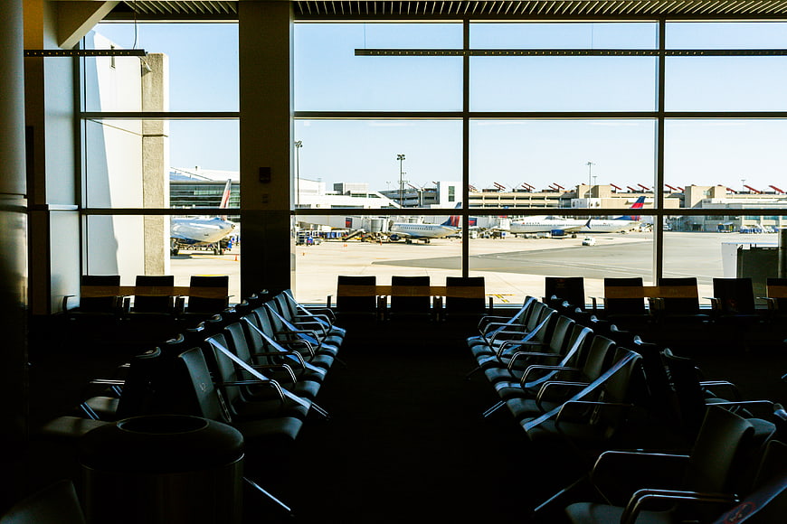 Empty Airport Terminal Waiting Area with View of Tarmac