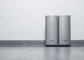Minimalist Bose Speakers on Wooden Surface