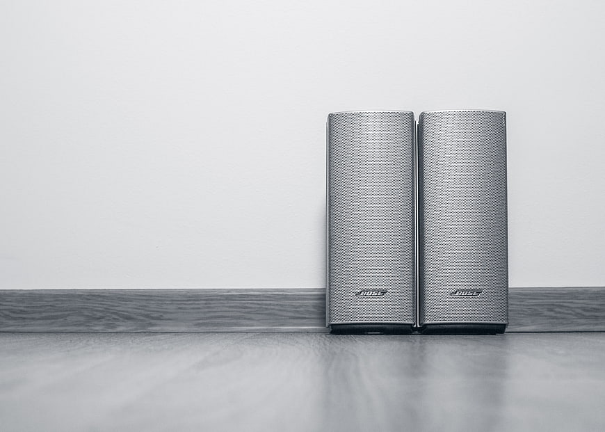 Minimalist Bose Speakers on Wooden Surface