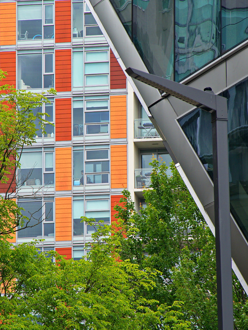 Modern Orange and Green Apartment Building Facade