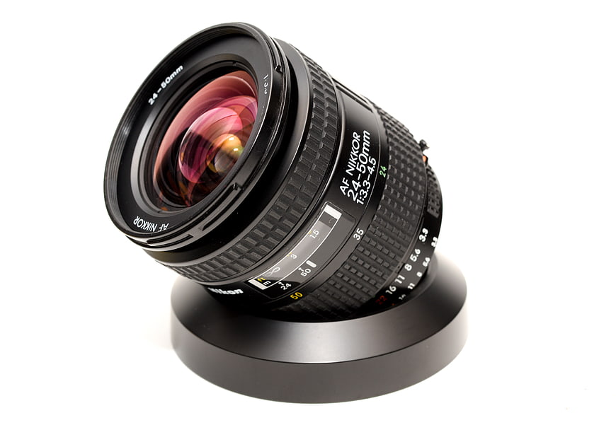 Black Nikon AF Nikkor 24-50mm Zoom Lens on White Background