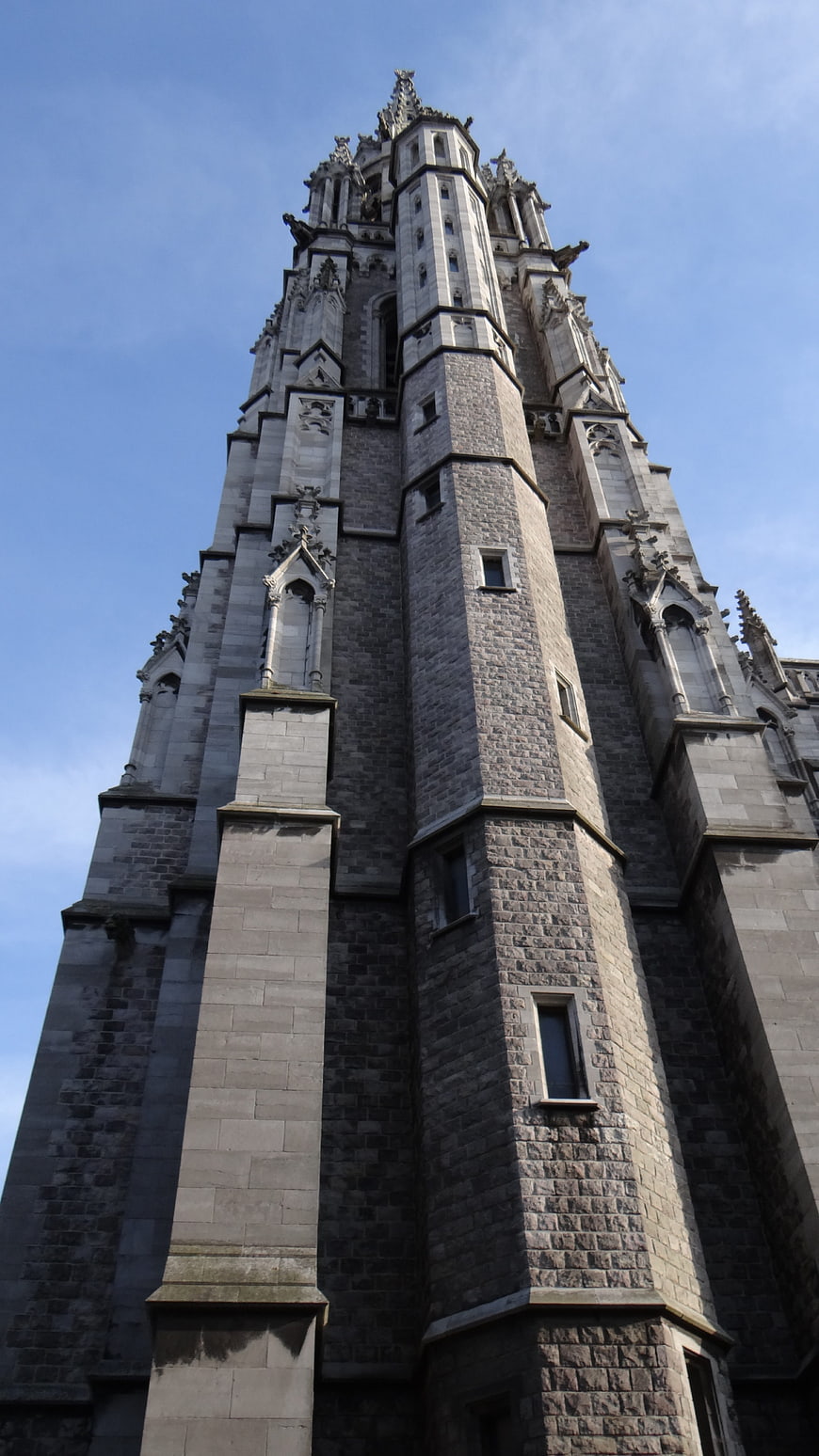 Low angle view of Gothic cathedral tower in Ostend, Belgium