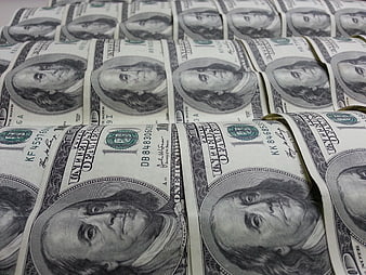 Stacks of One Hundred Dollar Bills Close Up