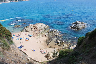 Aerial View of Secluded Mediterranean Beach Cove with Turquoise Water
