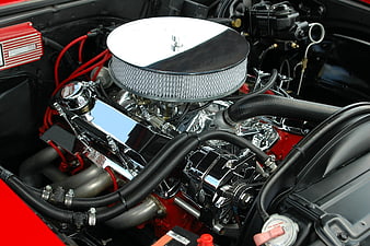 Chrome V8 Engine in Classic Red Muscle Car