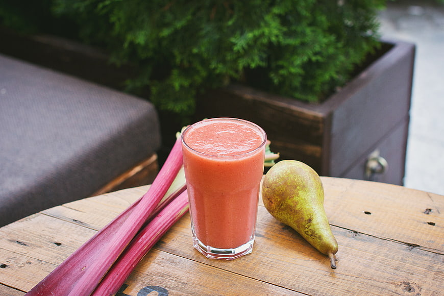 Fresh Rhubarb and Pear Smoothie on Wooden Table