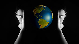 Conceptual image of a man holding a globe between his hands