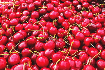 Vibrant Fresh Cherries With Green Stems Filling Frame