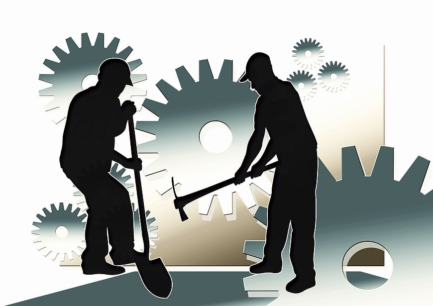 Silhouette of two workers with gears background