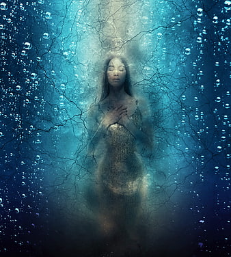 Ethereal woman in blue underwater environment with bubbles and cracks