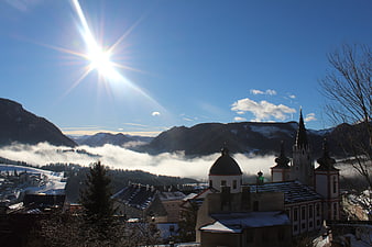 Winter Morning in a Mountain Town with Church and Fog