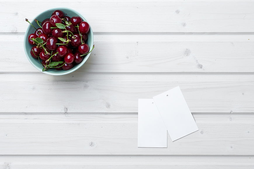 Top View of Fresh Cherries in Bowl with Blank Tags
