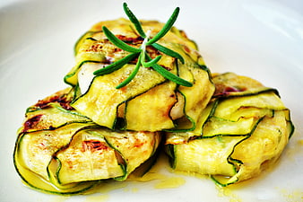 Grilled Zucchini Rolls with Rosemary Garnish