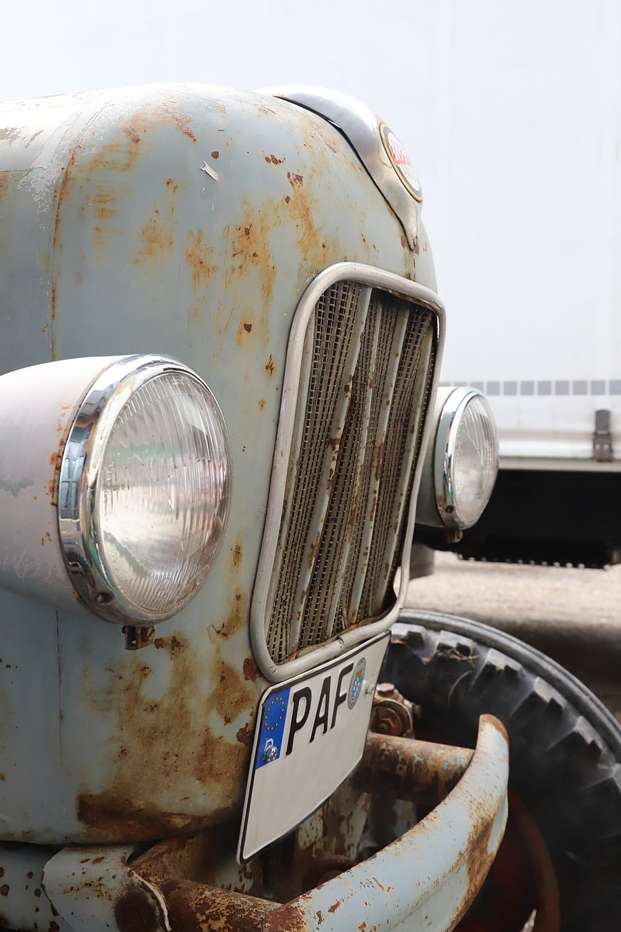 Close-up of vintage Lanz Bulldog tractor front grille and headlight