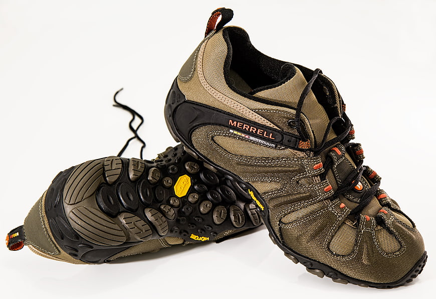 Tan Merrell Hiking Shoes on White Background