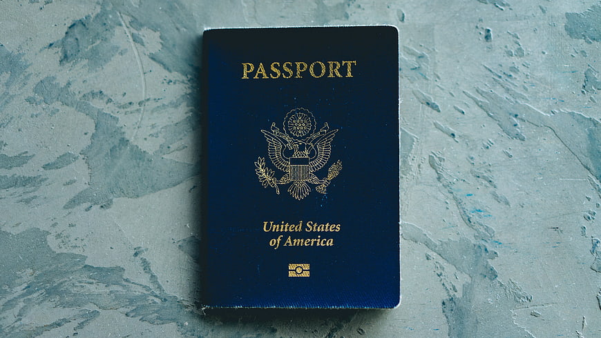 US Passport on Textured Blue Surface