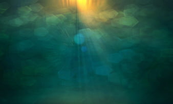 Abstract teal and gold bokeh background with light leaks
