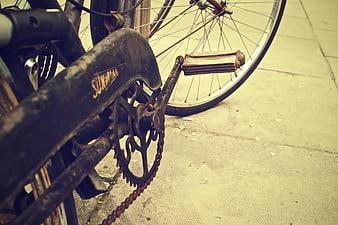 Close-up of vintage rusty bicycle chain and pedal