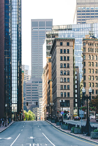 Urban Street View with Skyscrapers and Historic Buildings