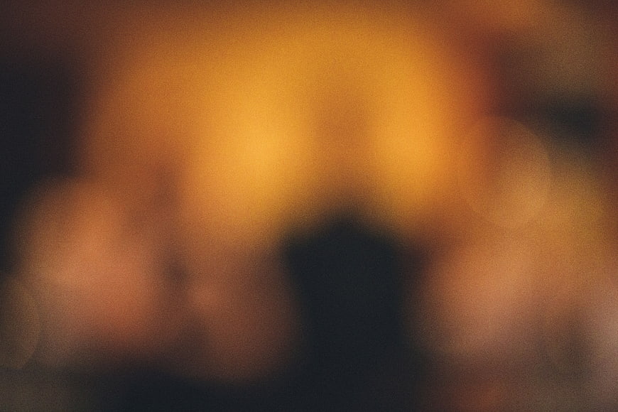 Abstract Blurred Orange and Black Background Texture
