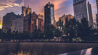 Dramatic Sunset Skyline Over 9/11 Memorial Reflecting Pool